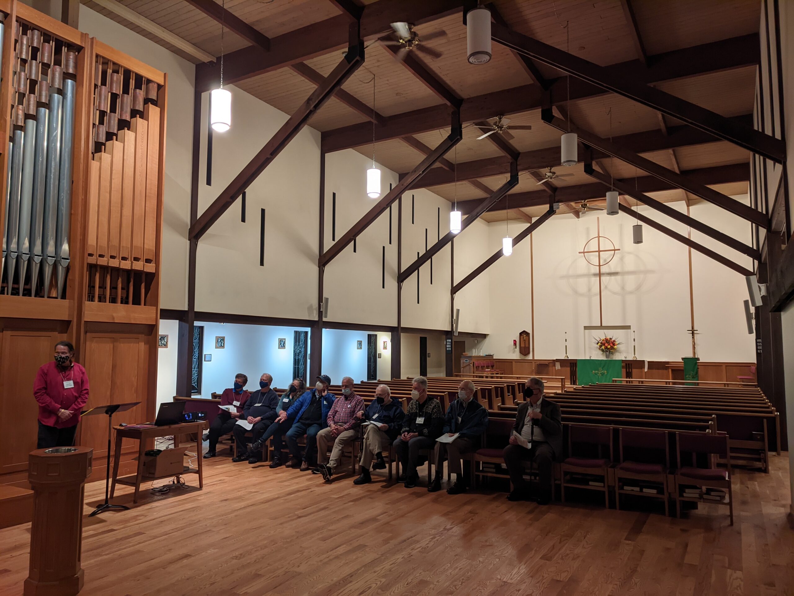 A long view of the nave, showing the organ placement against a side wall in the back