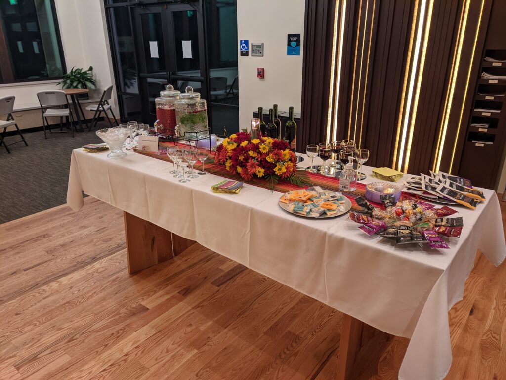 Table of refreshments and fresh flowers